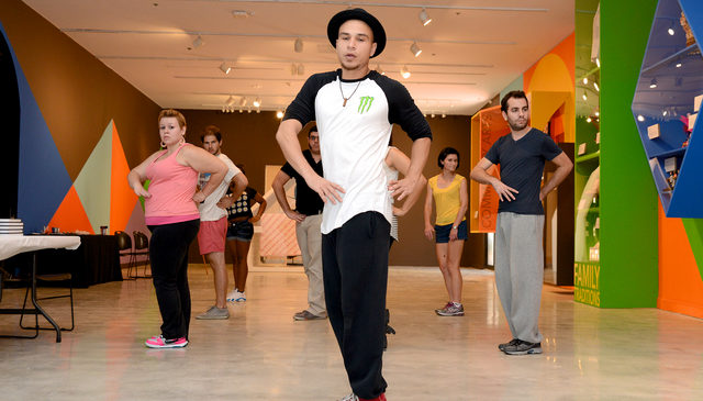 Crew member Nonms leads a popping workshop