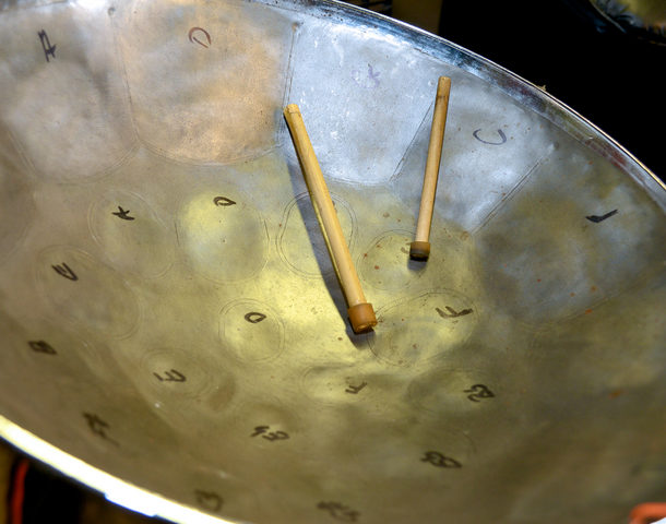 Steel pan (steel drum) with sticks