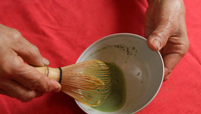 Mieko with tea ceremony bowl and whisk