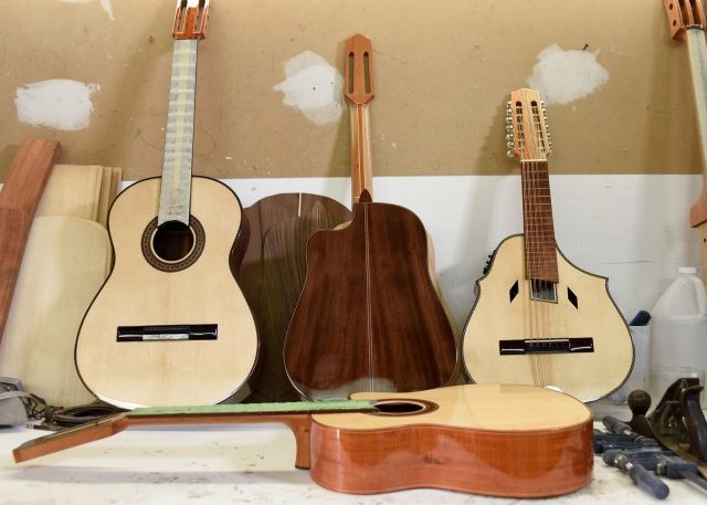 Finished and unfinished instruments in Leandro's workshop