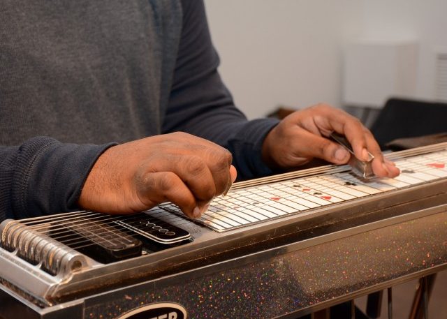 Chris Johnson playing his pedal steel guitar