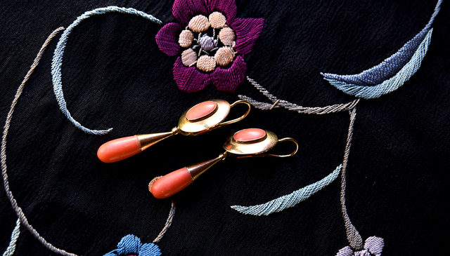 Coral earrings are believed to bring good luck in flamenco culture