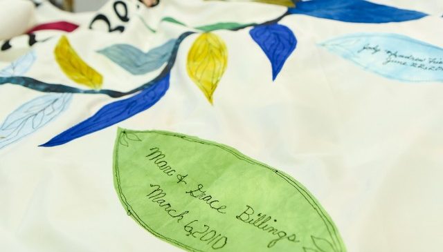 Nancy embroidered the names of the bride and groom on the leaves of the chuppah