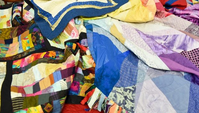 A collection of Nancy's quilts and Jewish textile art pieces